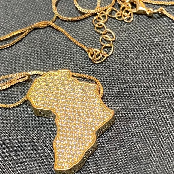 Gold Tone and CZ Encrusted Africa Pendant and 24 Inch Chain - Picture 1 of 3